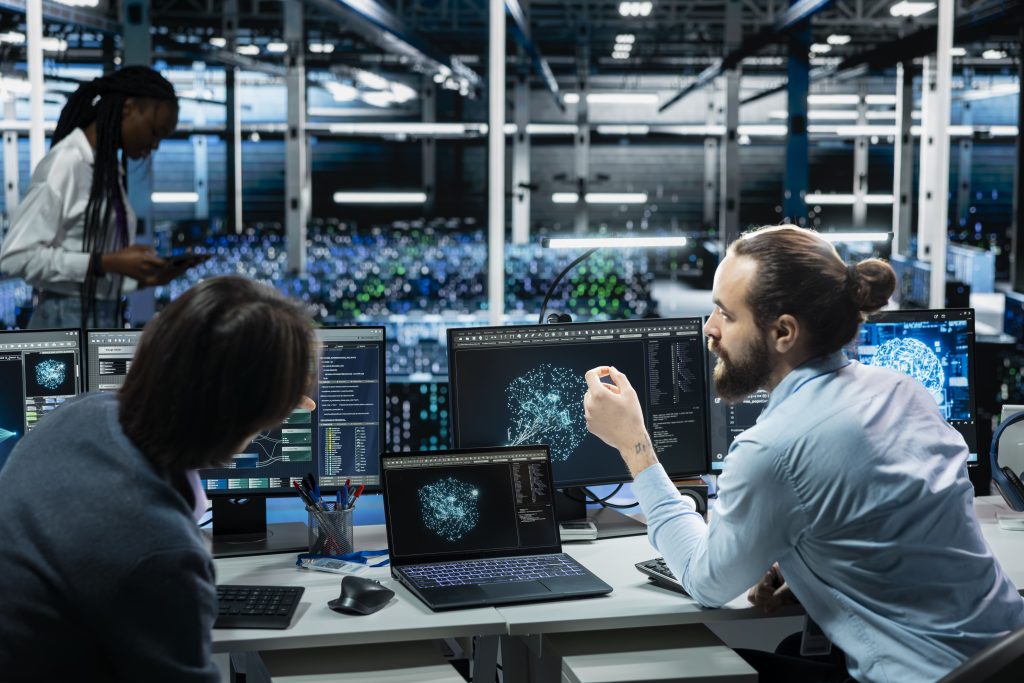 team programmers data center installing upgraded server racks systems helped by ai technology (1)